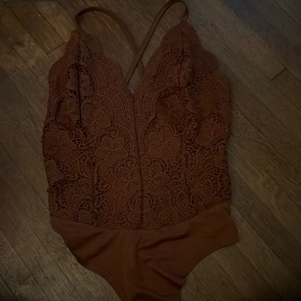 Orange lace bodysuit tank with criss-cross back